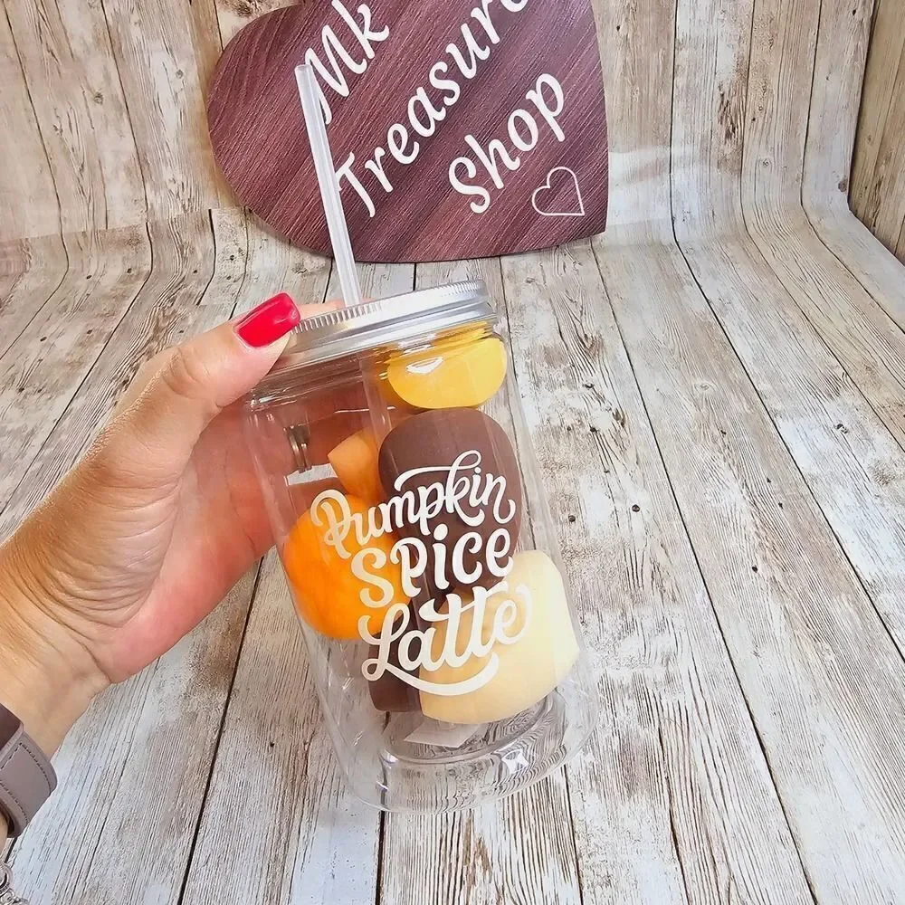 Pumpkin spice latte cup with makeup sponges